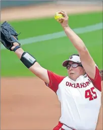  ?? OKLAHOMAN] ?? Oklahoma's Giselle Juarez winds up to throw a pitch Friday during Game 1 of a Super Regional in Norman. The Sooners beat Northweste­rn 3-0 and moved within one victory of clinching another Women's College World Series berth. [BRYAN TERRY/ THE