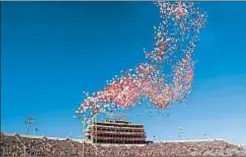  ?? AJ MAST/AP 2017 ?? Some colleges are ending the tradition of releasing balloons into the air before football games.
