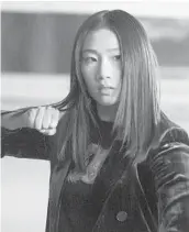  ?? KAILEY SCHWERMAN/THE CW ?? Olivia Liang learned martial arts as the lead of The CW’s new series,“Kung Fu,”which is inspired by the 1972 series starring David Carradine.