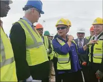  ?? ?? Energy Secretary Jennifer Granholm and U.S. Rep. Joe Courtney, D-2nd District, take a look at constructi­on on the City Pier in New London on Friday.