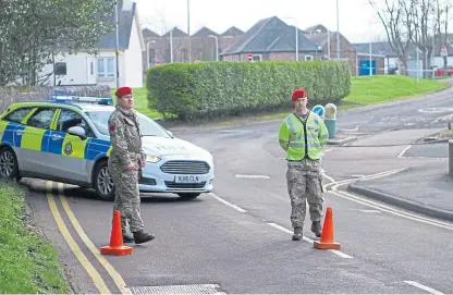  ?? Picture: Dougie Nicolson. ?? The road block in place after the grenade was handed in to Leuchars Station Army base.