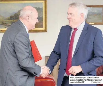  ?? BEN BIRCHALL ?? First Secretary of State Damian Green meets First Minister Carwyn Jones in Cardiff