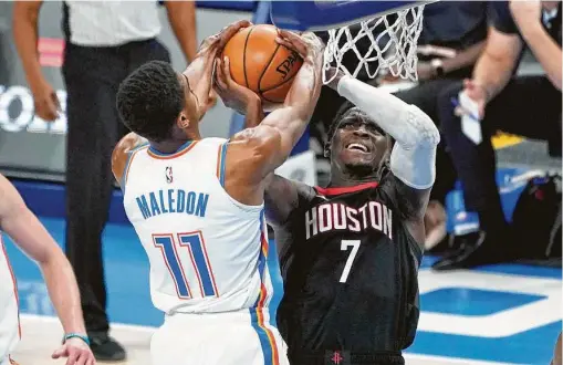  ?? Sue Ogrocki / Associated Press ?? Victor Oladipo, getting tied up with the Thunder’s Theo Maledon, scored 19 points but went 8-of-24 from the field and 1-of-8 on 3s to get there.