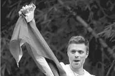  ??  ?? A file photo of Lopez saluting supporters, in Caracas. — Reuters photo