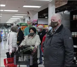  ?? LYRIC AQUINO — THE MORNING JOURNAL ?? Guests wait in line for corned beef dinners at Fligner’s Market on March 17.