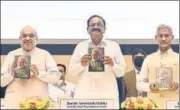  ?? ANI ?? Union home minister Amit Shah, Vice-President Venkaiah Naidu and external affairs minister S Jaishankar at the launch of a book titled ‘Modi@20 Dreams Meet Delivery’ in New Delhi on Wednesday.