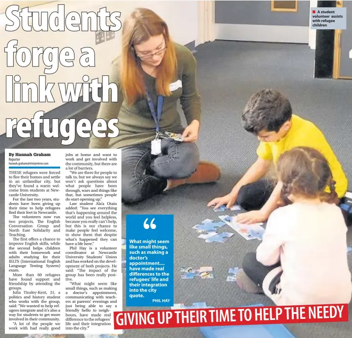  ??  ?? A student volunteer assists with refugee children