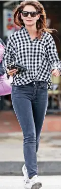  ??  ?? Crisp and cool: Actress Katie Holmes in gingham