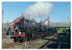  ?? ROBIN JONES ?? Left: Ivatt 2MT No. 41312 and 8F No. 48305 enter Quorn & Woodhouse on a light engine movement early on October 1. The GCR joined forces with Quorn residents to enter the annual East Midlands in Bloom competitio­n and following July’s judging, the village won a gold medal after being voted the best small town in the East Midlands. Quorn & Woodhouse station’s volunteer gardening team this year focused on red, whites, blues and purples for the late Queen’s Platinum Jubilee.