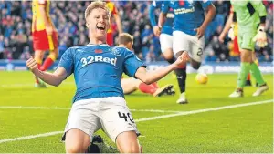  ?? SNS. ?? Ross McCrorie celebrates after scoring his first goal for Rangers.