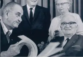  ??  ?? Presfident Lyndon Johnson gets a visit from former President Harry Truman. Johnson kept sending Americans to Vietnam when he knew the war was lost.| SUN- TIMES FILES