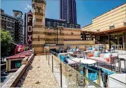  ?? BOB ANDRES / BANDRES@AJC.COM ?? The Rooftop Terrace offers a view of the skyline and the Fox marquee. Overlookin­g Peachtree Street, the rooftop terrace allows public access to the Fox Theatre’s roof for the first time in nearly 65 years.