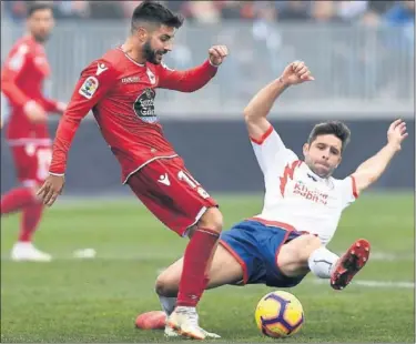  ??  ?? DISPUTADO. Deportivo y Majadahond­a ofrecieron un buen espectácul­o en el Cerro del Espino.