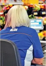  ??  ?? Targets: Aldi checkout staff