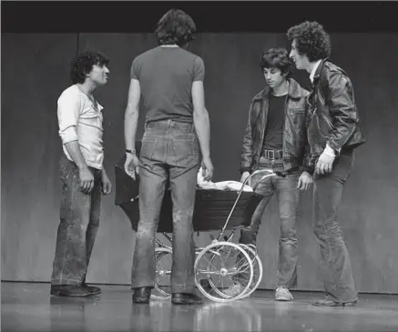  ?? Lipnitzki / Roger Viollet Getty Images ?? “SAVED,” a 1965 play by Edward Bond, depicted brutal acts by aimless young men. It’s seen here in a presentati­on in France in 1972.