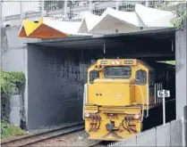  ??  ?? Critical: The screens are designed to protect the public from overhead wires that will power new trains. The wires will conduct electricit­y 100 times more powerful than that used in homes.