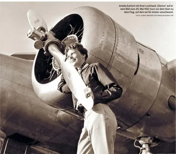  ?? FOTO: ALBERT BRESNIK/THE PARAGON AGENCY/AP ?? Amelia Earhart mit ihrer Lockheed „Electra“auf einem Bild vom 20. Mai 1937, kurz vor dem Start zu dem Flug, auf dem sie für immer verschwand.