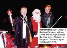  ??  ?? Festive fun Alyth Citizen of the Year Kathleen Jackson, Santa, and Young Citizen of the Year James Atkinson at last year’s Christmas lights switch-on in Alyth