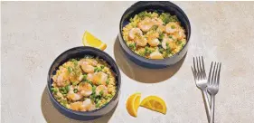  ?? TOM MCCORKLE/FOR THE WASHINGTON POST ?? Roasted Shrimp and Pea Couscous is just right for supper on a fall evening.