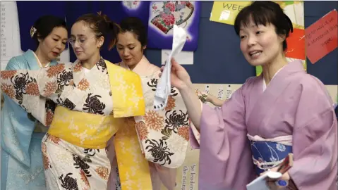  ??  ?? Action from St Kilian’s Multicultu­ral Day: Anna Macalliste­r is dressed in a traditiona­l Japanese kimono.