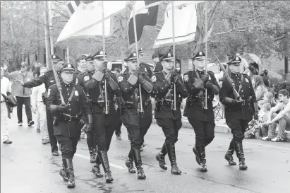  ??  ?? ABOVE: The Woonsocket Police Color Guard leads the 2017 Autumnfest Parade in Woonsocket Monday.