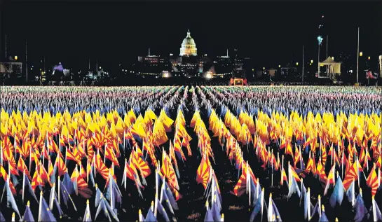  ??  ?? Nearly 200,000 flags are on display at the National Mall in Washington, DC ahead of Joe Biden’s inaugurati­on as the US president. The presentati­on, known as ‘Field of Flags’, represents the American people who are unable to travel to the US capital for Biden’s oath ceremony due to Covid-19 curbs and security threats.