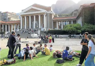  ?? /File picture ?? Social cohesion: Students mingle on the campus at the University of Cape Town. The government has appointed a committee to accelerate transforma­tion at South African universiti­es.