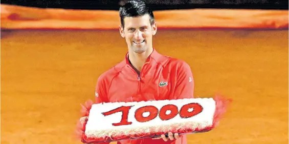  ?? AFP ?? Milenario. Novak Djokovic celebró su hito con un torta luego del buen triunfo sobre Casper Ruud. Ahora va por su primer título del año.