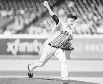  ?? Elizabeth Conley / Staff photograph­er ?? For the second time in a week against the Royals, Zack Greinke pitched well but received scant support.