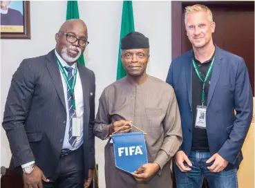  ??  ?? Vice President Osinbajo (middle) with NFF President Pinnick (left) and FIFA team leader Heyral Kaj Jurgen