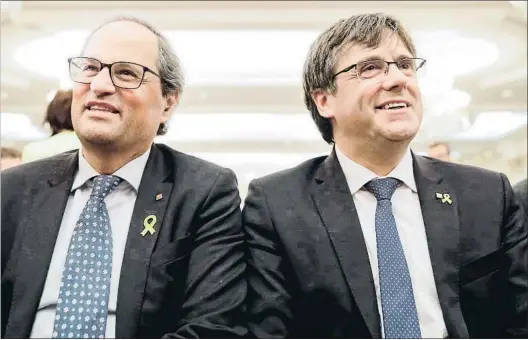  ?? THIERRY ROGE / AFP ?? El presidente de la Generalita­t, Quim Torra, junto a su antecesor, Carles Puigdemont, ayer en Bruselas