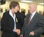 ??  ?? Charles County Public Schools Superinten­dent Kimberly Hill speaks with former Superinten­dent John Bloom.