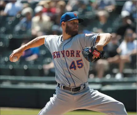  ?? CHARLES REX ARBOGAST - THE ASSOCIATED PRESS ?? New York Mets starting pitcher Zack Wheeler delivers during the first inning of a baseball game against the Chicago White Sox Thursday, Aug. 1, 2019, in Chicago.