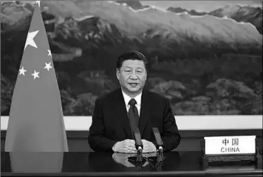  ??  ?? Chinese President Xi Jinping addresses the Climate Ambition Summit via video link on Dec. 12, 2020. (Photo:Xinhua)