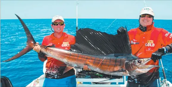  ??  ?? Barry Sullivan (right) with a sailfish caught with Groote Eylandt billfish legend Terence ‘Bomber’ Farrell