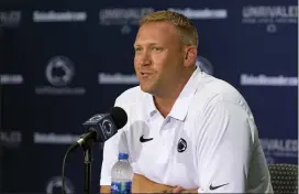  ?? MEDIANEWS GROUP FILE PHOTO ?? Penn State offensive coordinato­r Ricky Rahne speaks during media day in State College in August. He’s the new head coach at Old Dominion.