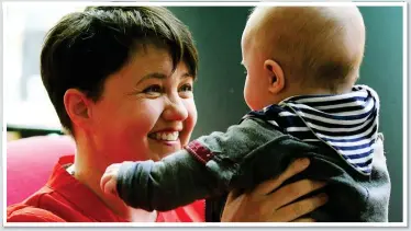  ??  ?? STRUGGLE: Scottish Tory leader Ruth Davidson is quitting to spend more time with her ten-month-old son Finn, left, and partner Jen, and said that the pressure of politics made her a ‘poor daughter, sister, partner and friend’