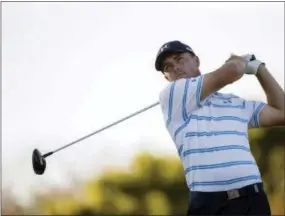  ?? WILLIE J. ALLEN JR. — THE ASSOCIATED PRESS ?? Jordan Spieth tees off on the 17th hole during the third round of the Hero World Challenge