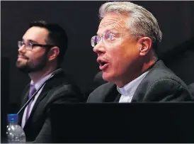  ?? CAROLYN KASTER / THE ASSOCIATED PRESS ?? Brian Sietsema, right, a Greek Orthodox priest and former editor for MerriamWeb­ster, was elevated to pronouncer at this year’s Scripps National Spelling Bee.