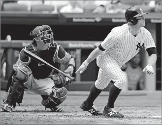  ?? FRANK FRANKLIN II/ASSOCIATED PRESS ?? Brett Gardner of the Yankees follows through on a three-run home run as Orioles catcher Caleb Joseph, left, watches during the second inning of Saturday’s game at New York. Gardner homered twice and the Yankees won 12-4.