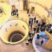  ?? ATOMIC ENERGY ORGANIZATI­ON OF IRAN 2019 ?? Technician­s, officials and media converge at the Arak heavy water reactor’s secondary circuit in a facility in Arak, Iran.