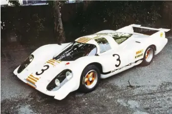  ??  ?? Above left: 917-001 continued in its role as a show car at the Frankfurt auto show, wearing an unusual gold ‘block’ design