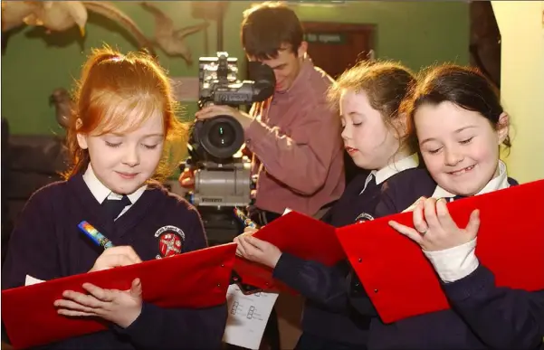  ??  ?? Lights, Camera, Action......Sabrina Lynch, (Left) Niamh McKenna and Bonnie Bray pupils from Knockbridg­e National School who were filmed by Kairus production­s in Stephensto­wn Pond for the “Evening Prayer” on RTE.