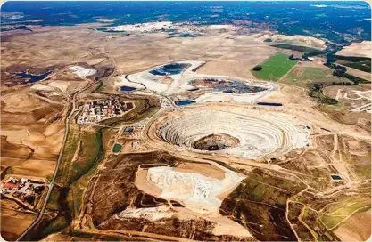  ??  ?? Ariel view of Kansanshi mine in Africa’s second largest copper producer, Zambia whose domestic debt position has more than doubled over the last 2 years to USD5.1billion Kwacha equivalent yet not backed by strong economic growth.