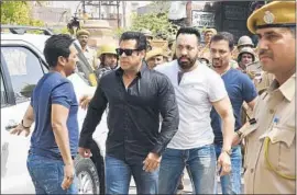  ?? Sunil Verma Associated Press ?? SALMAN KHAN, second from left, has denied poaching two deer and a gazelle in 1998. His supporters are irate that four other men were acquitted in the case.