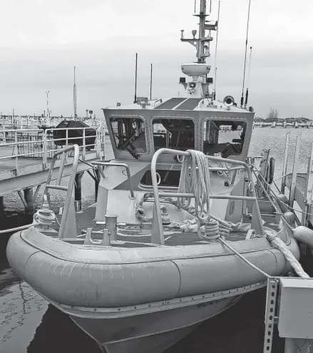  ?? STAN MADDUX, SOUTH BEND TRIBUNE ?? This U.S. Coast Guard boat in Michigan City could split time with another coast guard station under plans to make the station in Michigan City a part-time facility beginning in 2024.