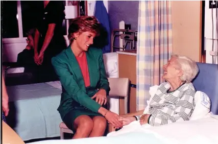  ??  ?? Princess Diana pictured meeting a patient at Southmead Hospital in 1991; and during a visit to Bristol in 1987, left; below, a young girl lays a bouquet outside Bristol Cathedral after Diana’s death in 1997