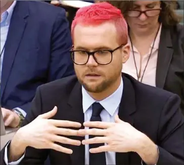  ?? AFP/PRU ?? Canadian data analytics expert Christophe­r Wylie, who worked at Cambridge Analytica, appears as a witness before the Digital, Culture and Media Committee of members of the British parliament at the Houses of Parliament in central London on Tuesday. MPs...