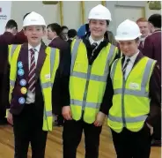  ??  ?? Kitted out The St Margaret’s youngsters tried out hard hats and hi-vis vests