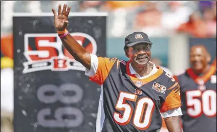  ?? ASSOCIATED PRESS ?? In this Sept. 10, 2017, file photo former Cincinnati Bengals cornerback Ken Riley waves to the crowd in Cincinnati during a halftime 50th anniversar­y ceremony of a game against the Baltimore Ravens. Riley, who was later a head coach and athletic director at his alma mater Florida A&M, died Sunday, the university announced. He was 72.